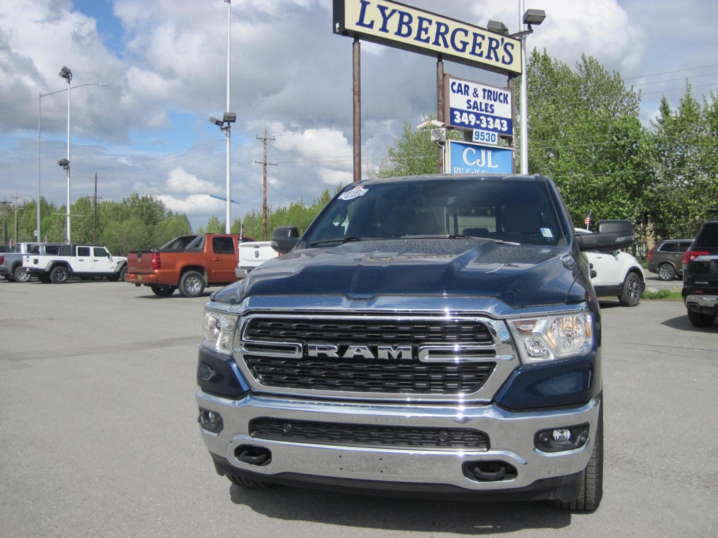 2023 blue /gray RAM 1500 Big Horn Crew Cab 4WD (1C6SRFMTXPN) with an 5.7L V8 OHV 16V engine, 8A transmission, located at 9530 Old Seward Highway, Anchorage, AK, 99515, (907) 349-3343, 61.134140, -149.865570 - Photo#1